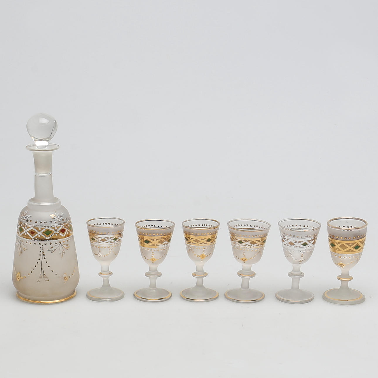 LIKÖRSERVIS. Glas. 7 delar. 1900-talets början. Förgylld dekor.