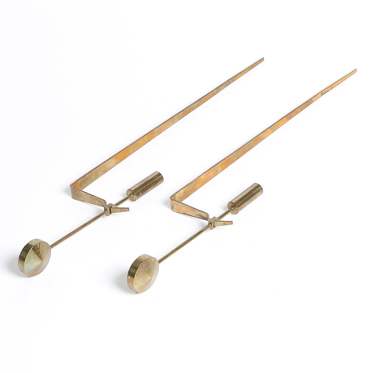 VÄGGLJUSSTAKAR, 1 par, mässing, "Pendel", Pierre Forsell, Skultuna, 1900-talets andra hälft.