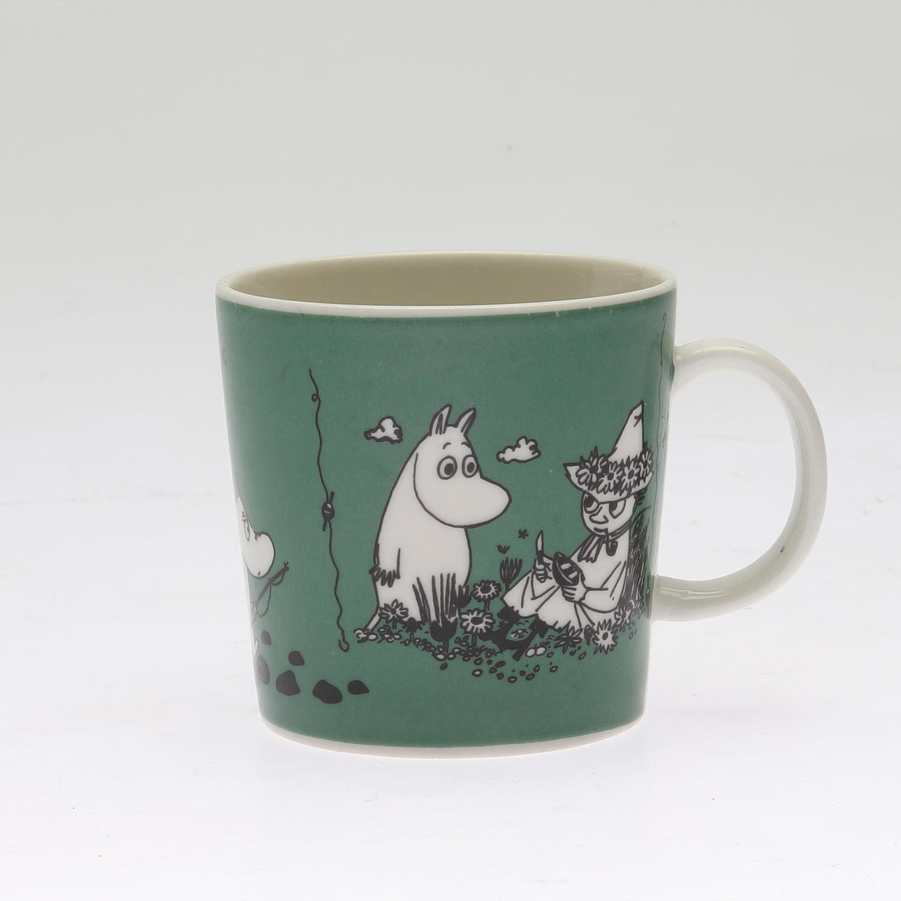 MUMINMUGG, porslin, "Mörkgrön", Arabia, Finland.