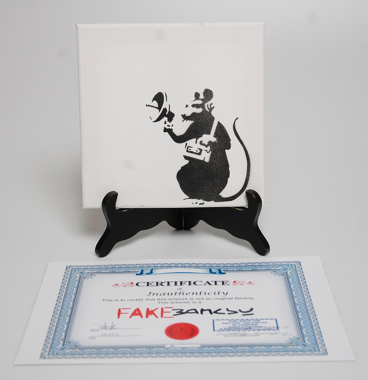 BANKSY. konstinstallation, New York , Oktober 2013, med certifikat " Fake Banksy ".