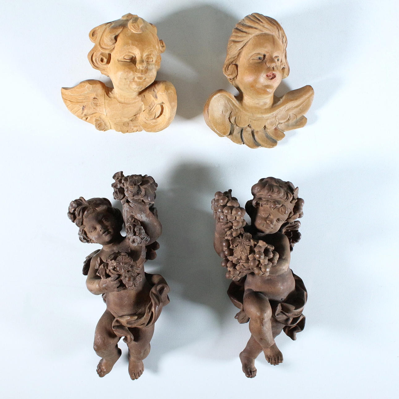 Engel, Skulpturen, geschnitztes Holz, 4 Stück.