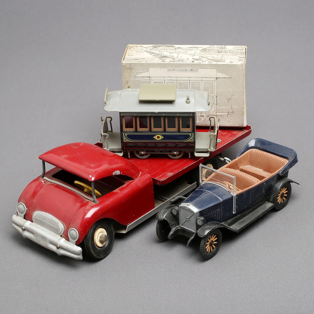 KRUGER & STENSRUD truck with tipping mechanism, clockwork.