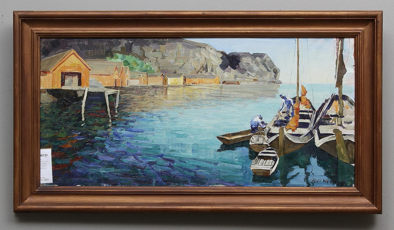 KNUT NORMAN. Motiv med segelbåtar och fiskebodar. Olja på duk. Signerad.