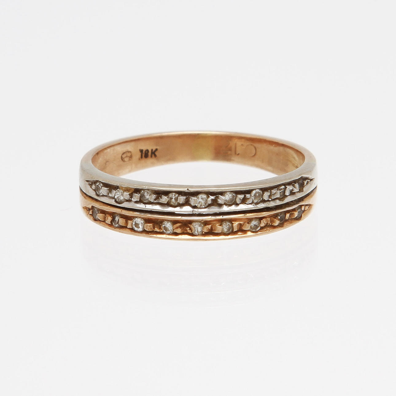 RING, 18K rödguld samt vitguld med 18 diamanter, totalt ca 0,12ct. 2,1g.