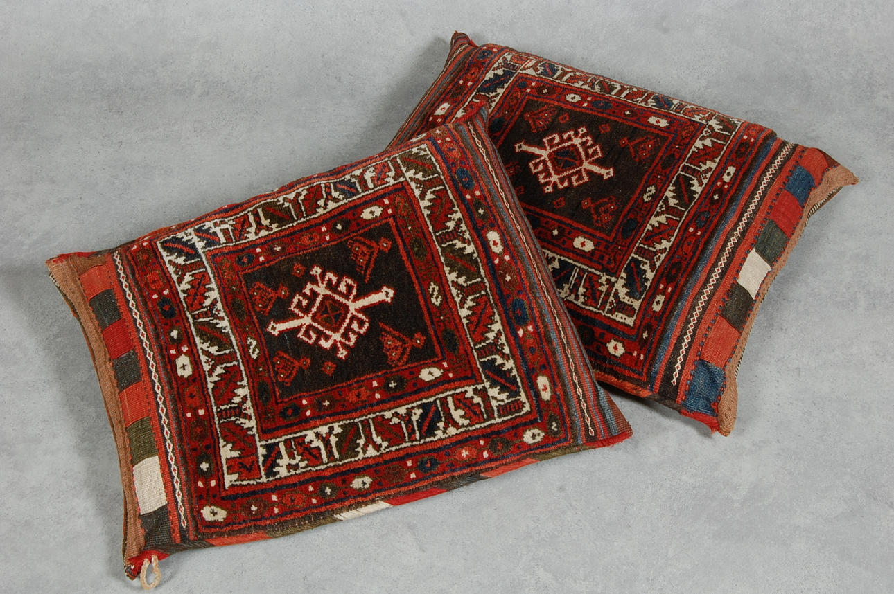 PACKVÄSKOR, Iran, 2 st omgjorda till kuddar 1900-tal.