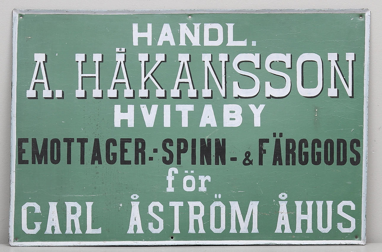 SKYLT, "Handlare A.Håkansson, Hvitaby......". 1900-tal.