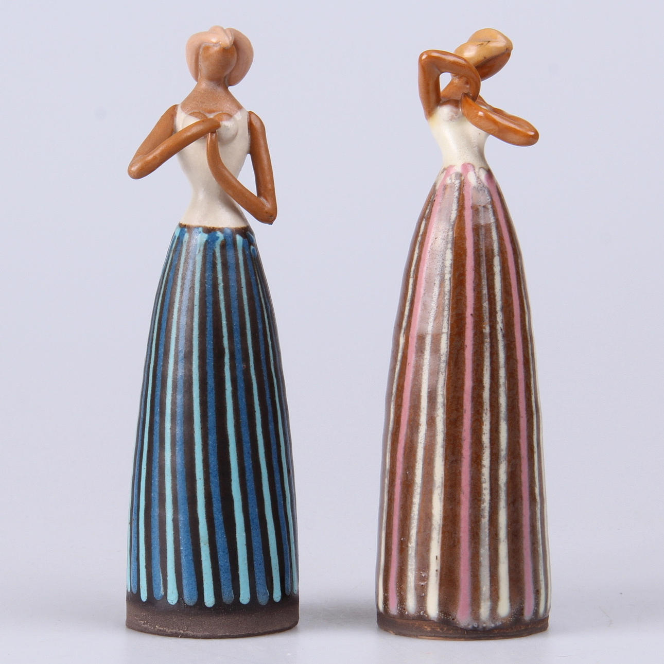 FIGURINER, 2 st. "Backafallsflickan", Cay Cedergren.