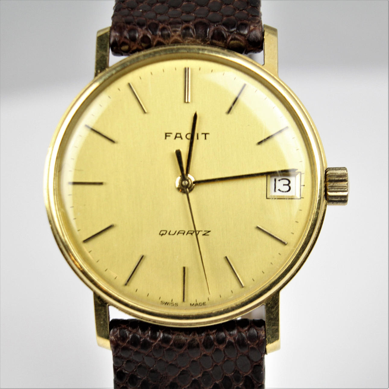 HERRUR Facit 18K med läderband quartz.