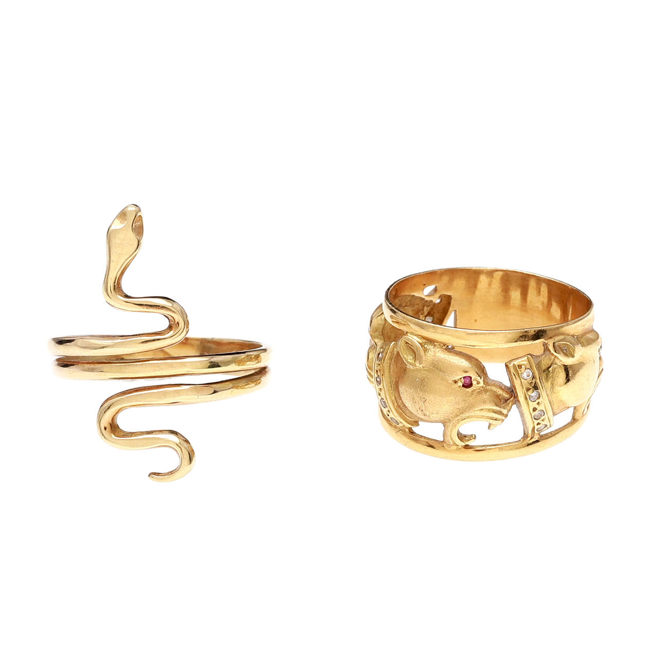 Två guldringar i form av djur.