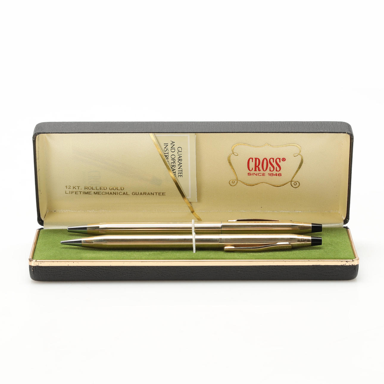 Pennset Cross. förgyllt i 12K guld.