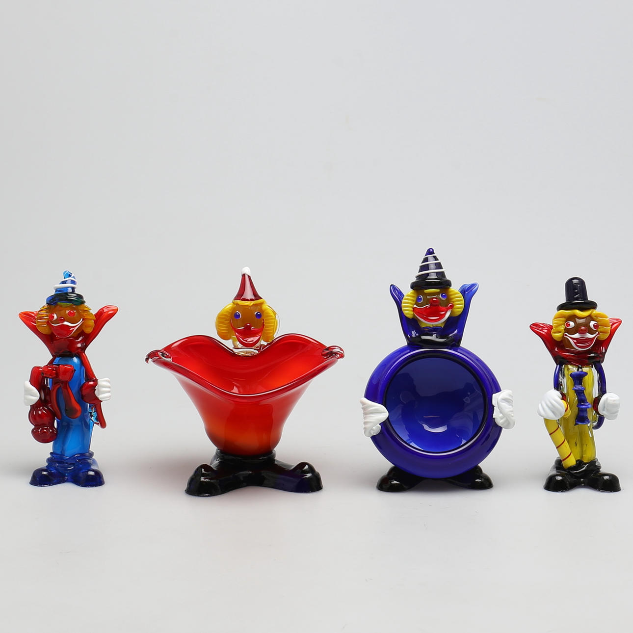 SKULPTURER. 4 st. Glas. Clowner.
