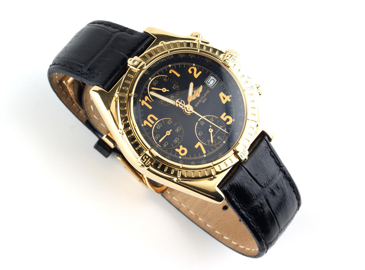 BREITLING Chronomat, 750 gult guld med läderband med viklås, automatisk.