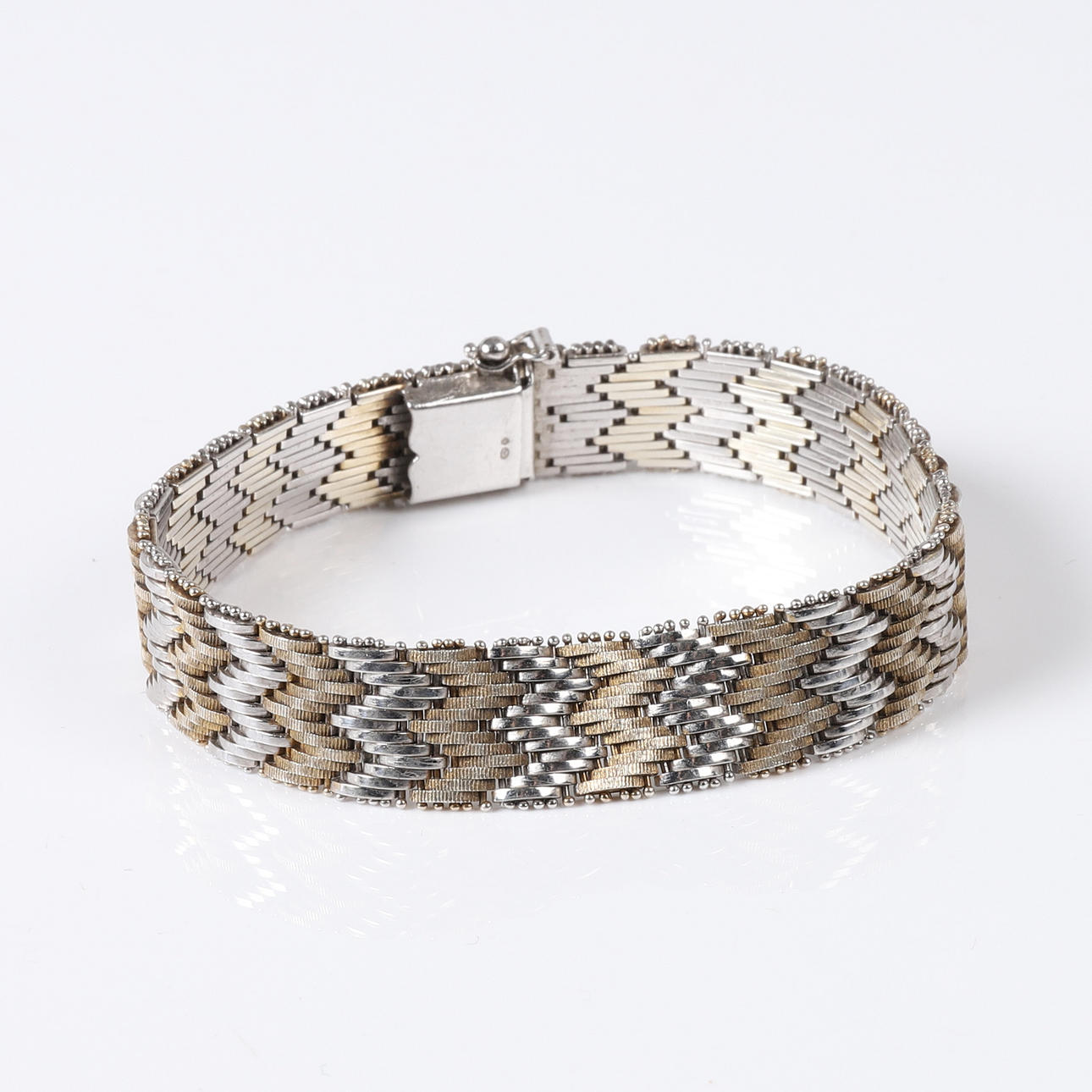 BRACELET, Two colored silver.