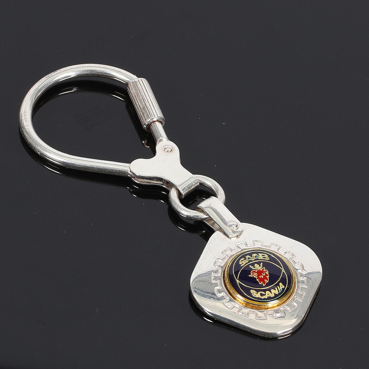 (864) NØGLERING, Sterling sølv Saab Scania, 1900-tallet.