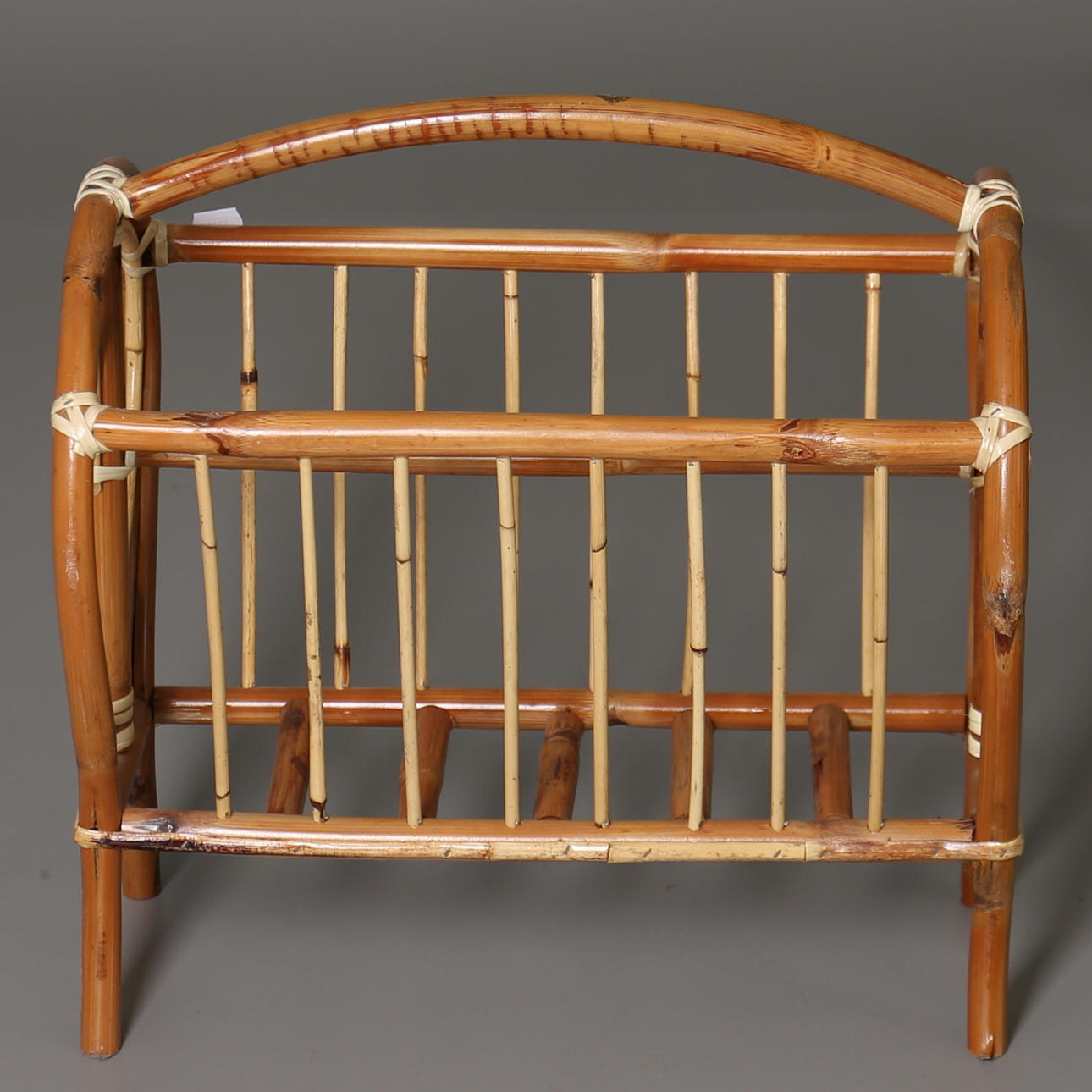 NEWSPAPER BASKET. Bamboo and rattan. Second half of the 20th century.