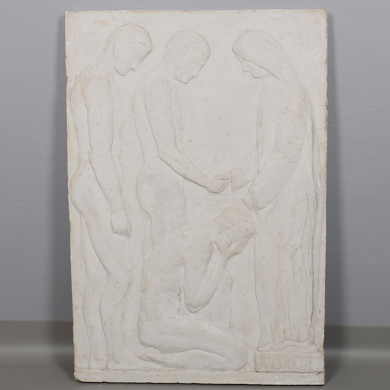 GUSTAV NORDAHL. VÄGGRELIEF i gips. "Avskedet". Signerad och daterad G N 1945.