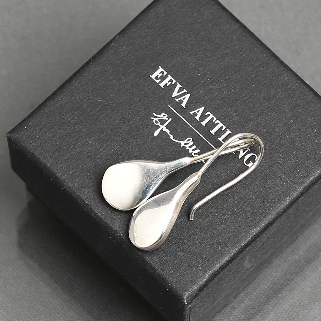 EFVA ATTLING. Earrings, pair, sterling silver, "Tears for ears".