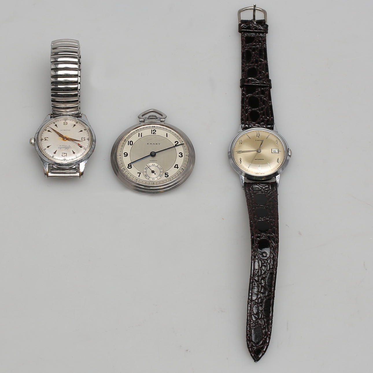 KLOCKOR. 3 st. Armbandsur samt fickur. Timex. Atlantic. Exakt.