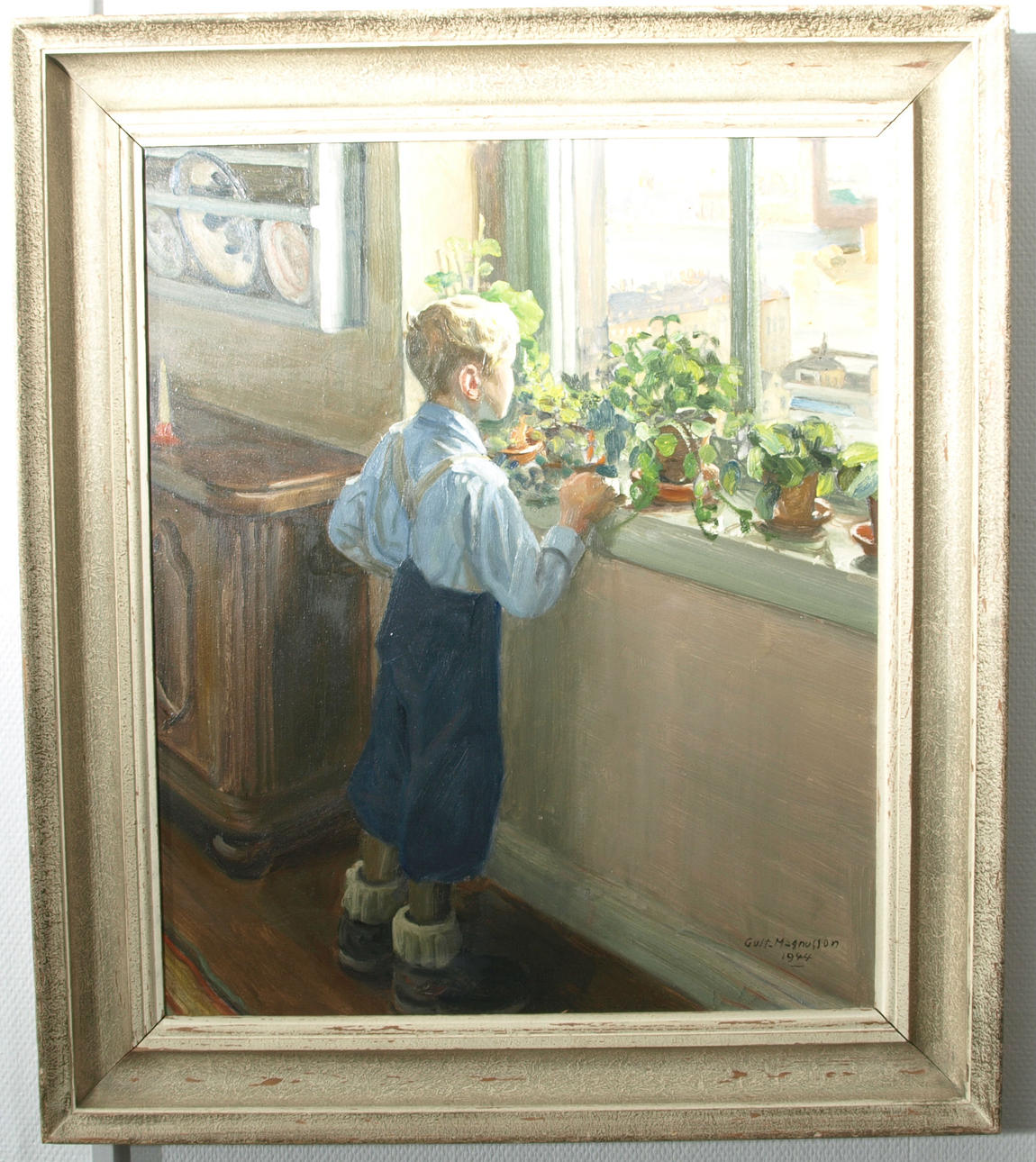 GUSTAV MAGNUSSON. Olja på pannå, Stockgolm genom ett fönster, signerad Gust. Magnusson 1944.