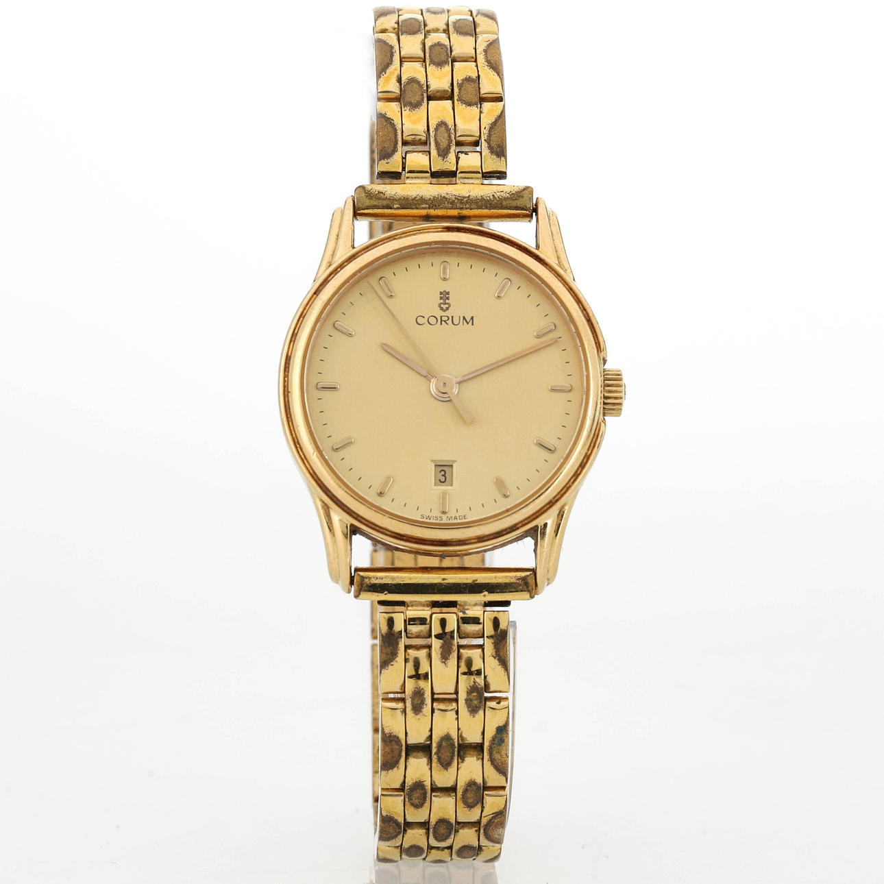 CORUM, wristwatch, 18K gold, quartz, 1990s.