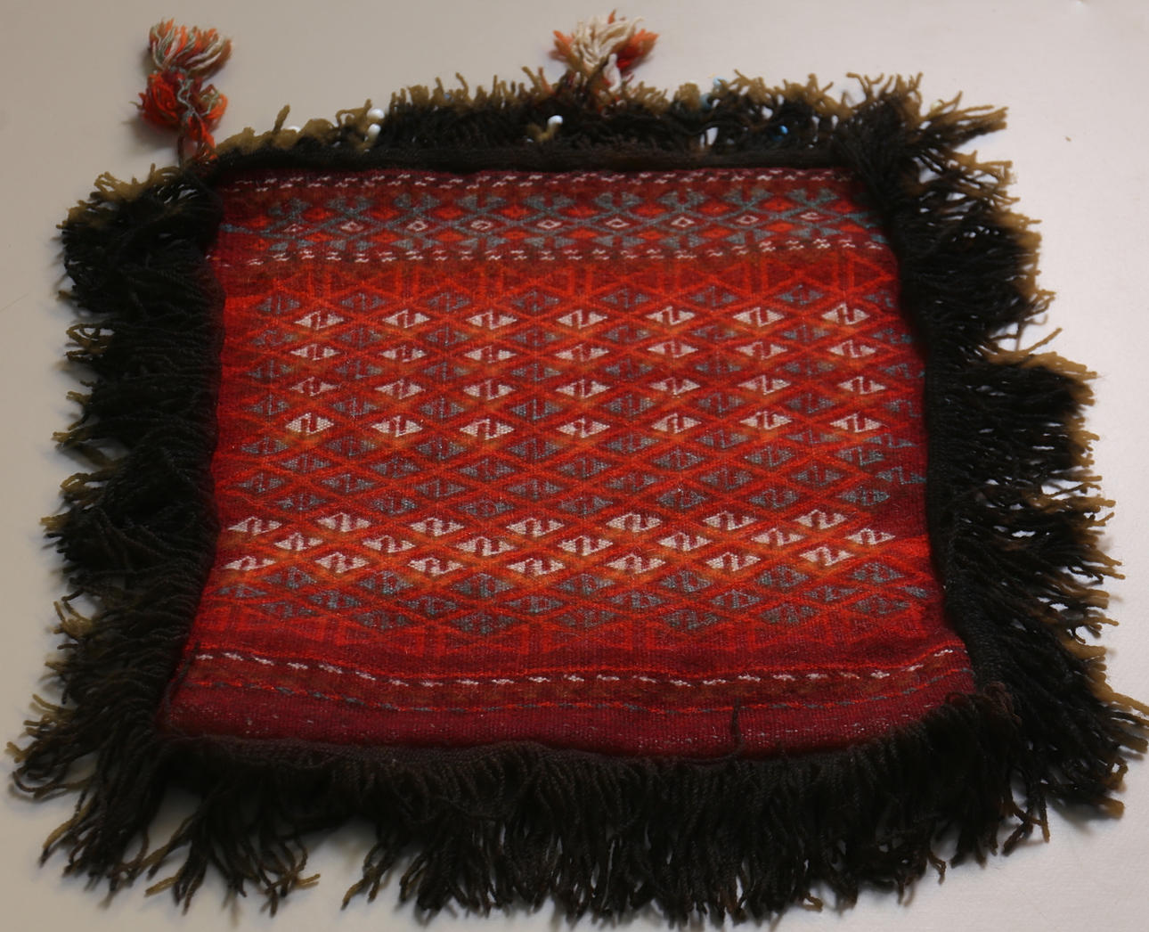 SADELVÄSKA/KUDDFODRAL. Kelim. 1900-tal.