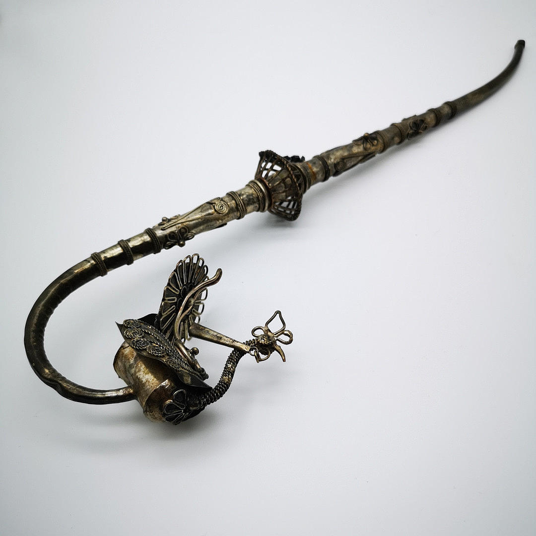 ORIENTAL OPIUM PIPE WITH PEACOCK MOTIF.