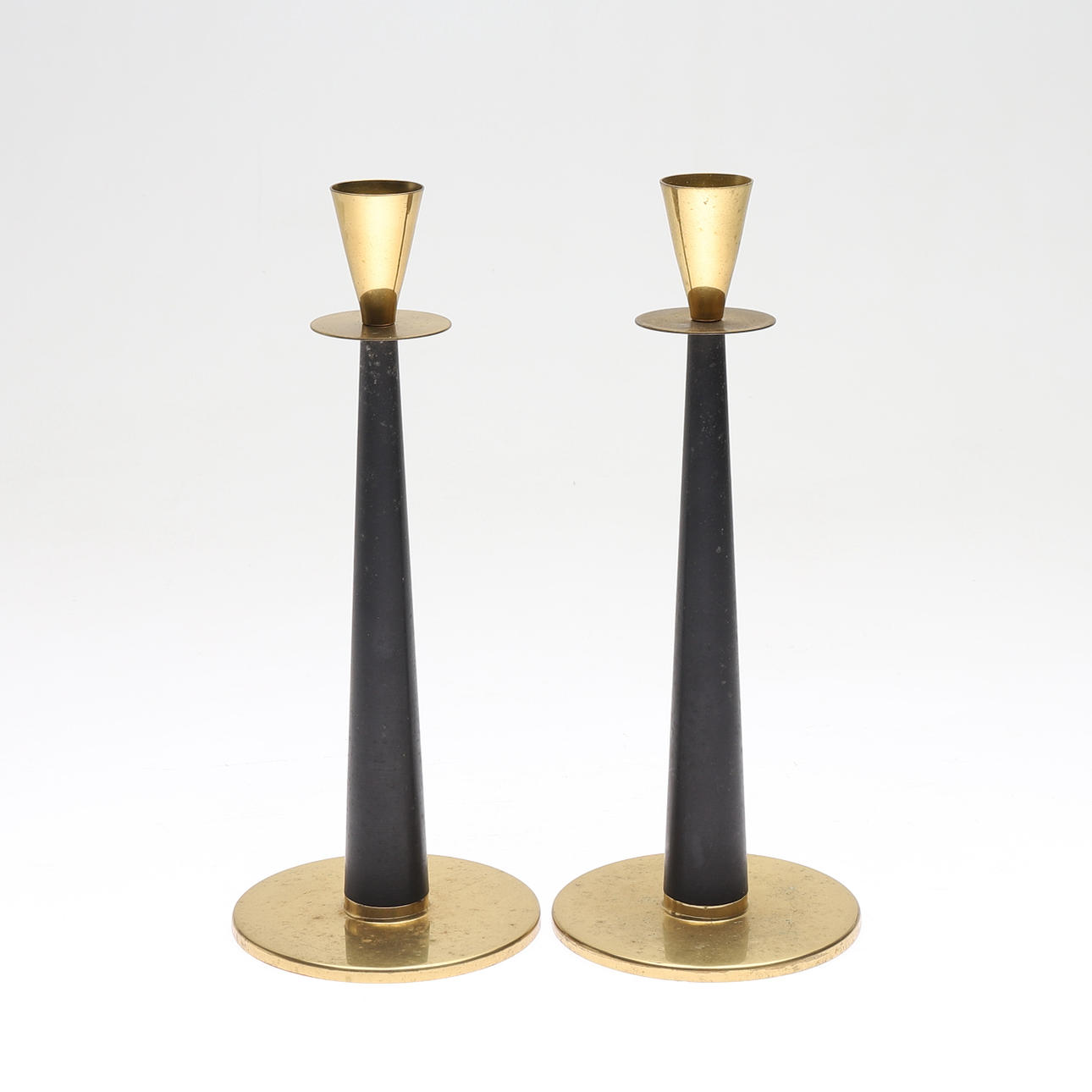 ADAM THYLSTRUP. candlesticks, a pair, brass/nylon, NilsJohan, around the middle of the 20th century.