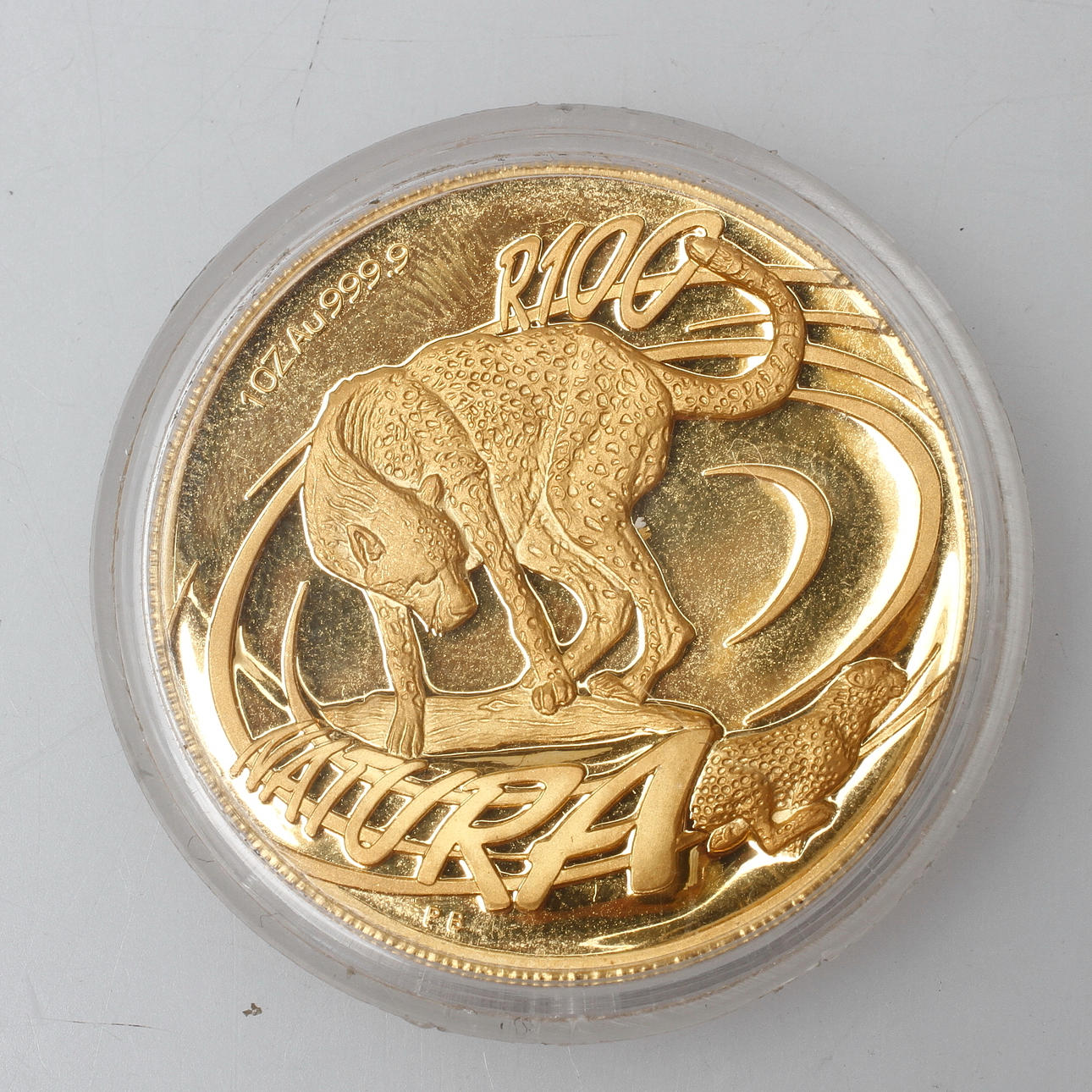 GULDMYNT, R100, 24k guld, vikt ca 31,1 gr.