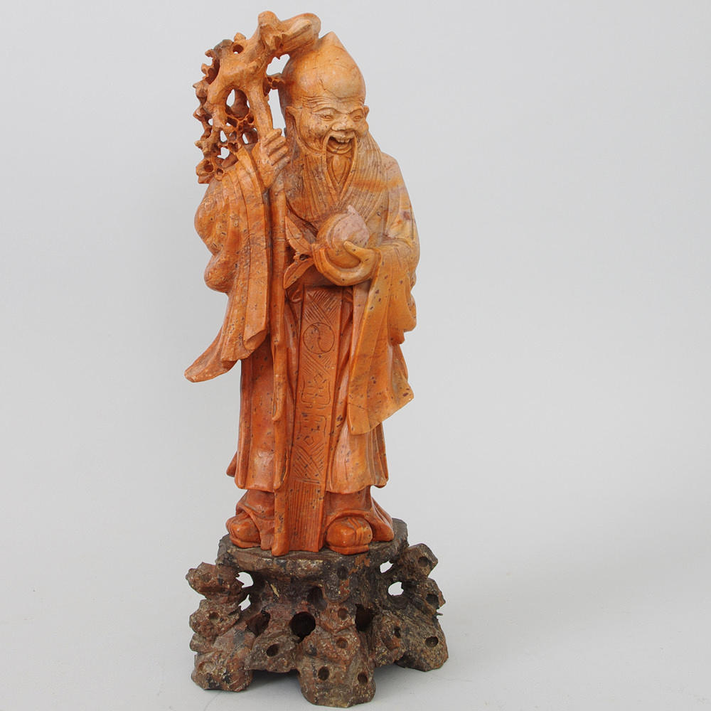 SKULPTUR, röd sten, orientalisk man.