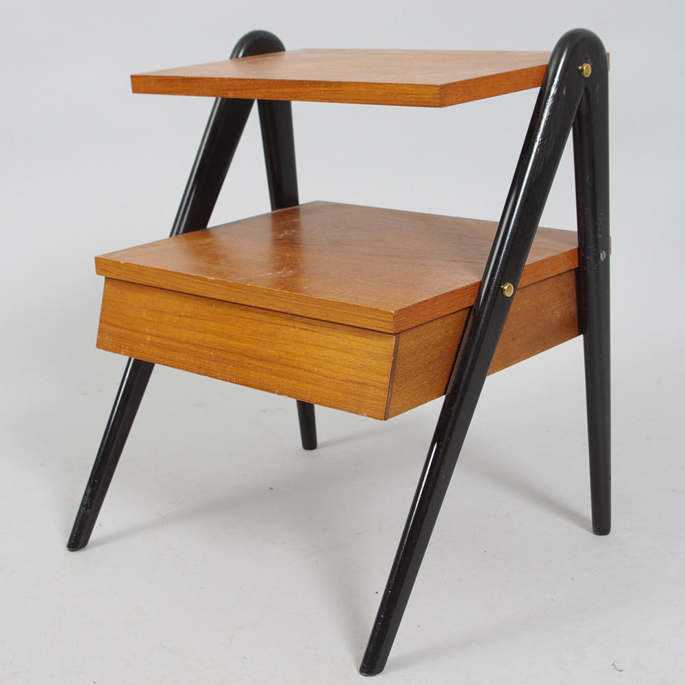 BED TABLE, teak with black painted ends, 1950s.