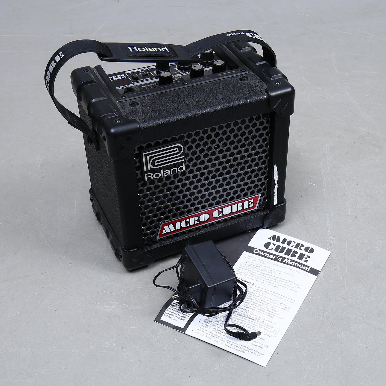 GUITAR AMPLIFIER, Roland MicroCube, serial number PY04708.