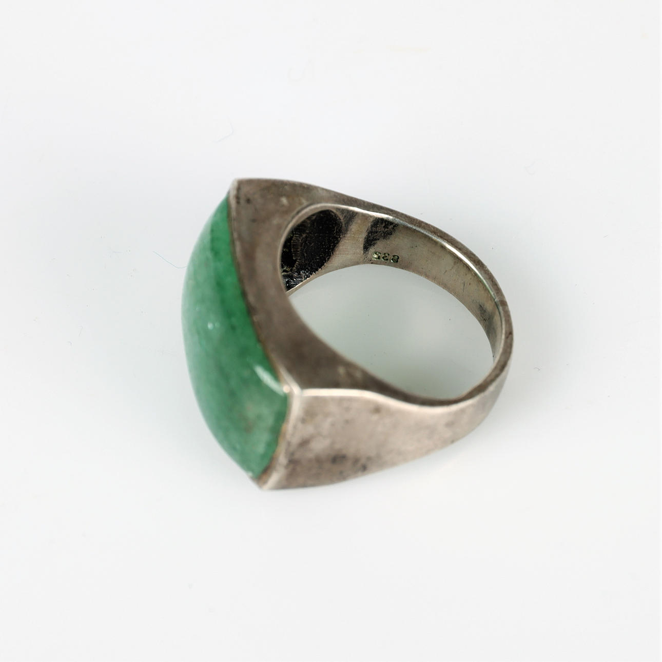 Signet ring, silver with green stone.