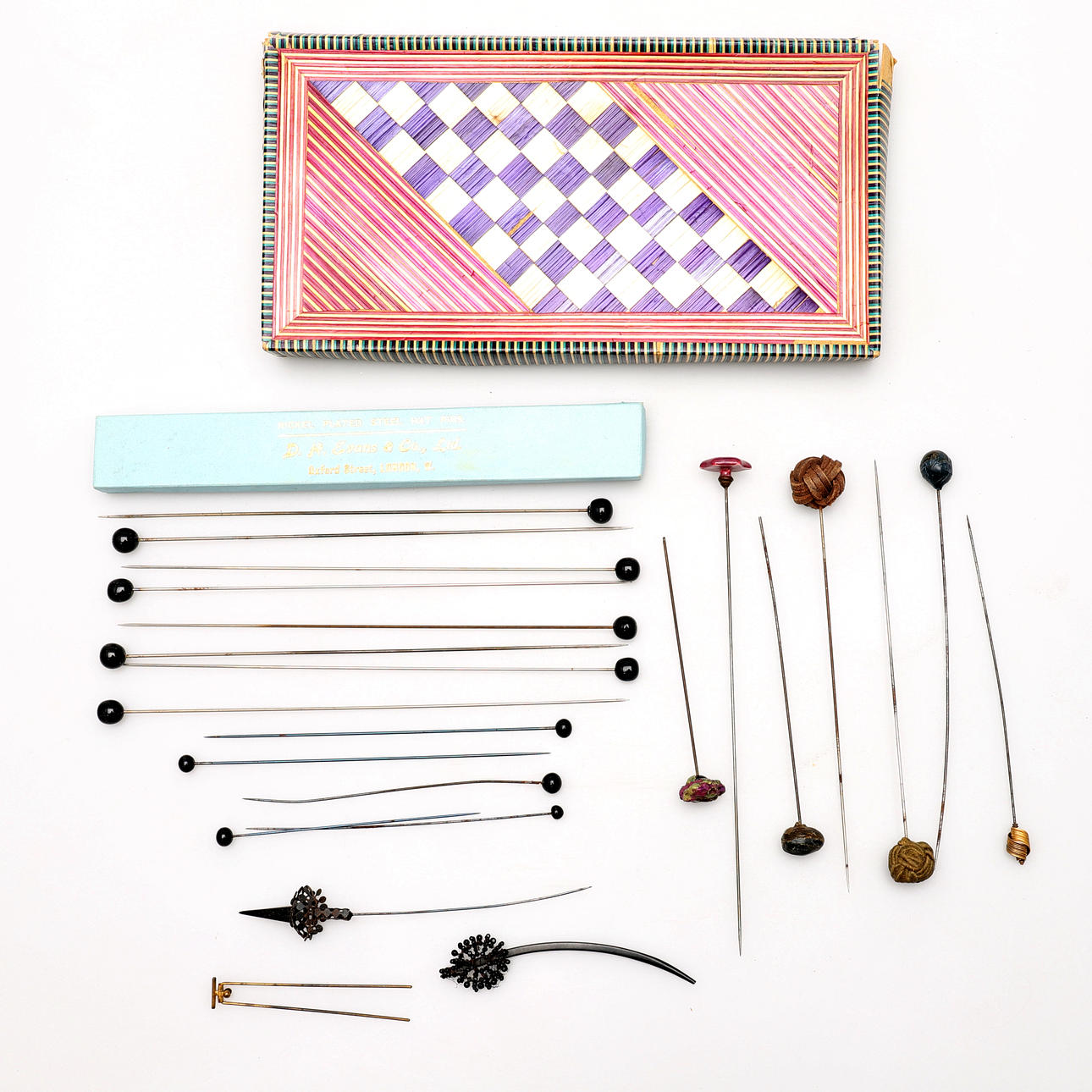 A COLLECTION OF HAT PINS.