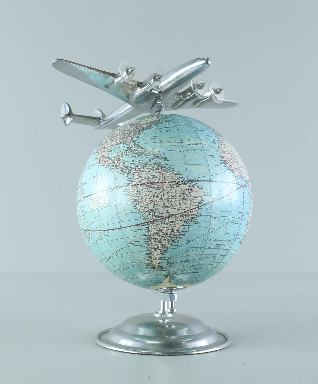 GLOBE Weber Costello with Airplane. Chicago, Illinois 1900s.