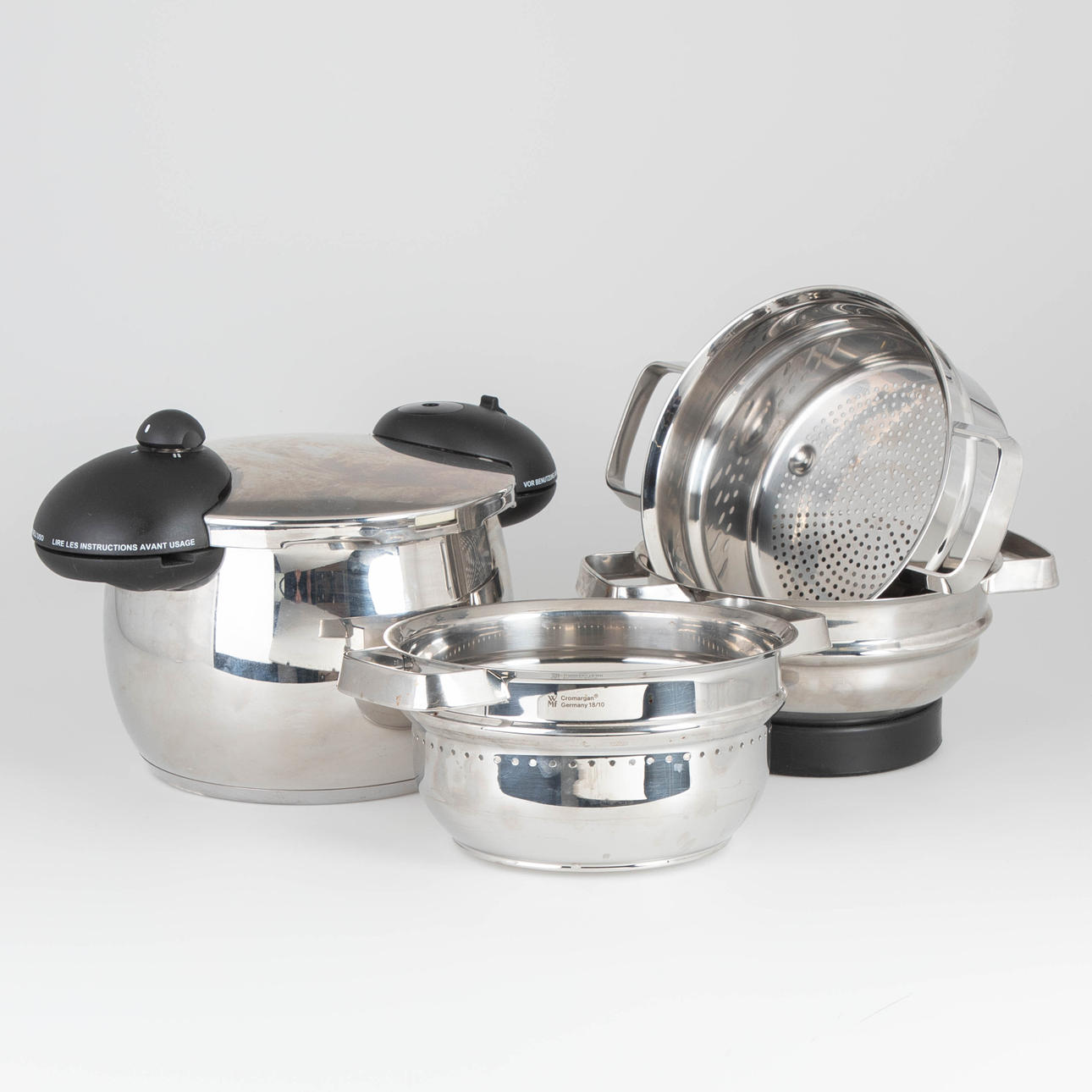 Alessi, pressure cooker 'Mami' + 3 WMF steam inserts.