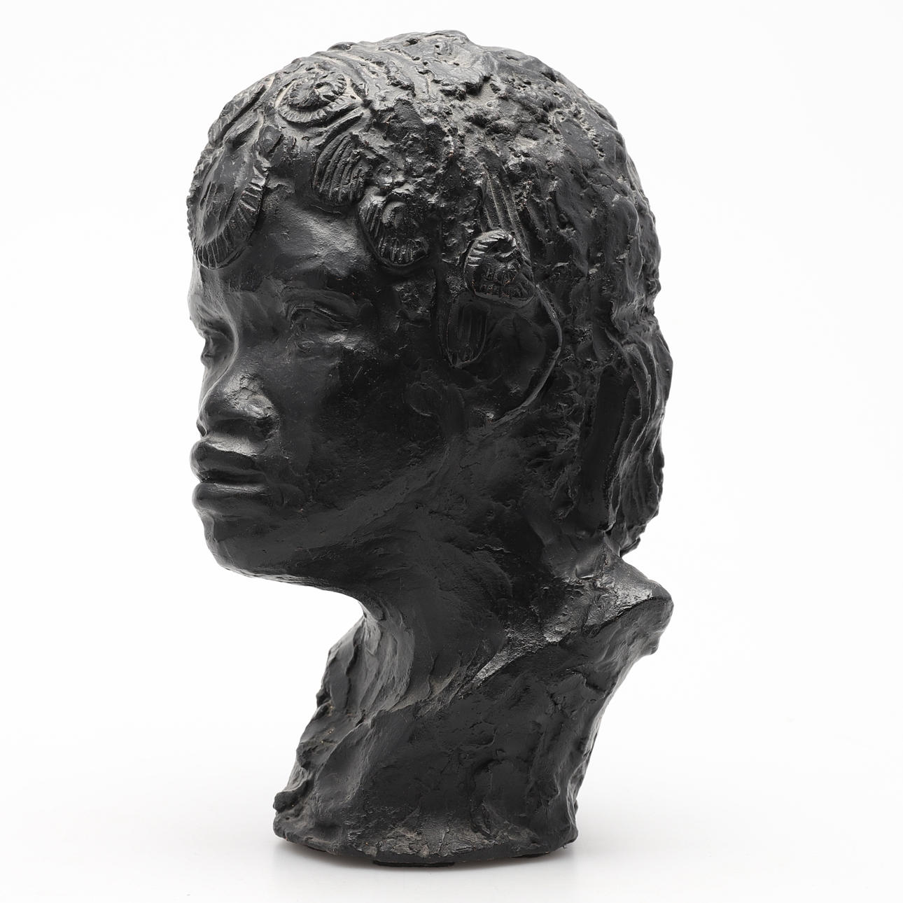 SKULPTUR, i form av huvud.