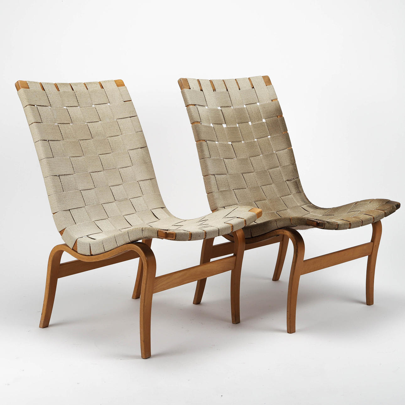 BRUNO MATHSSON. Chairs "Eva" a pair, beech, saddle girth, Dux.