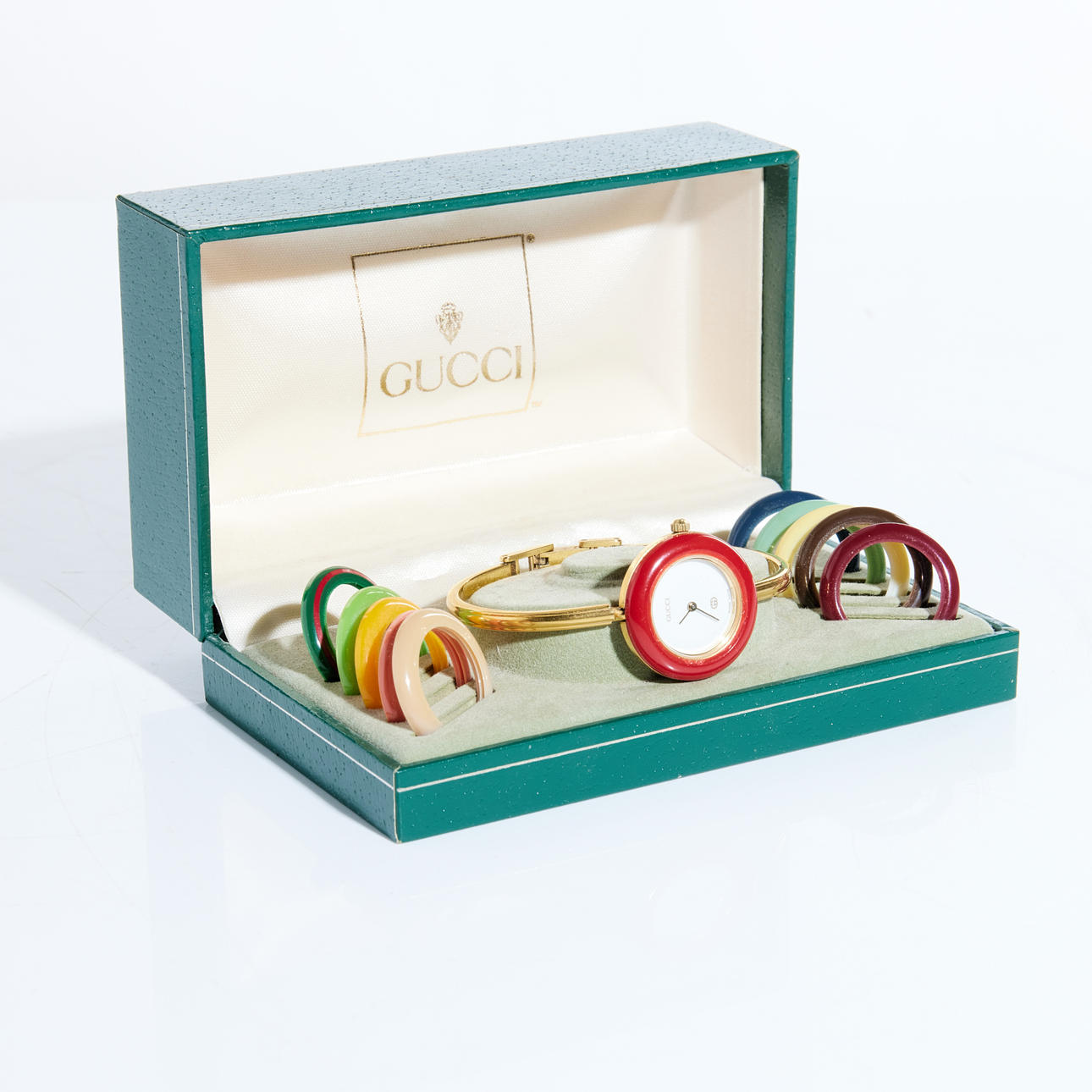 GUCCI. Wristwatch with 12 replaceable plastic housing rings.