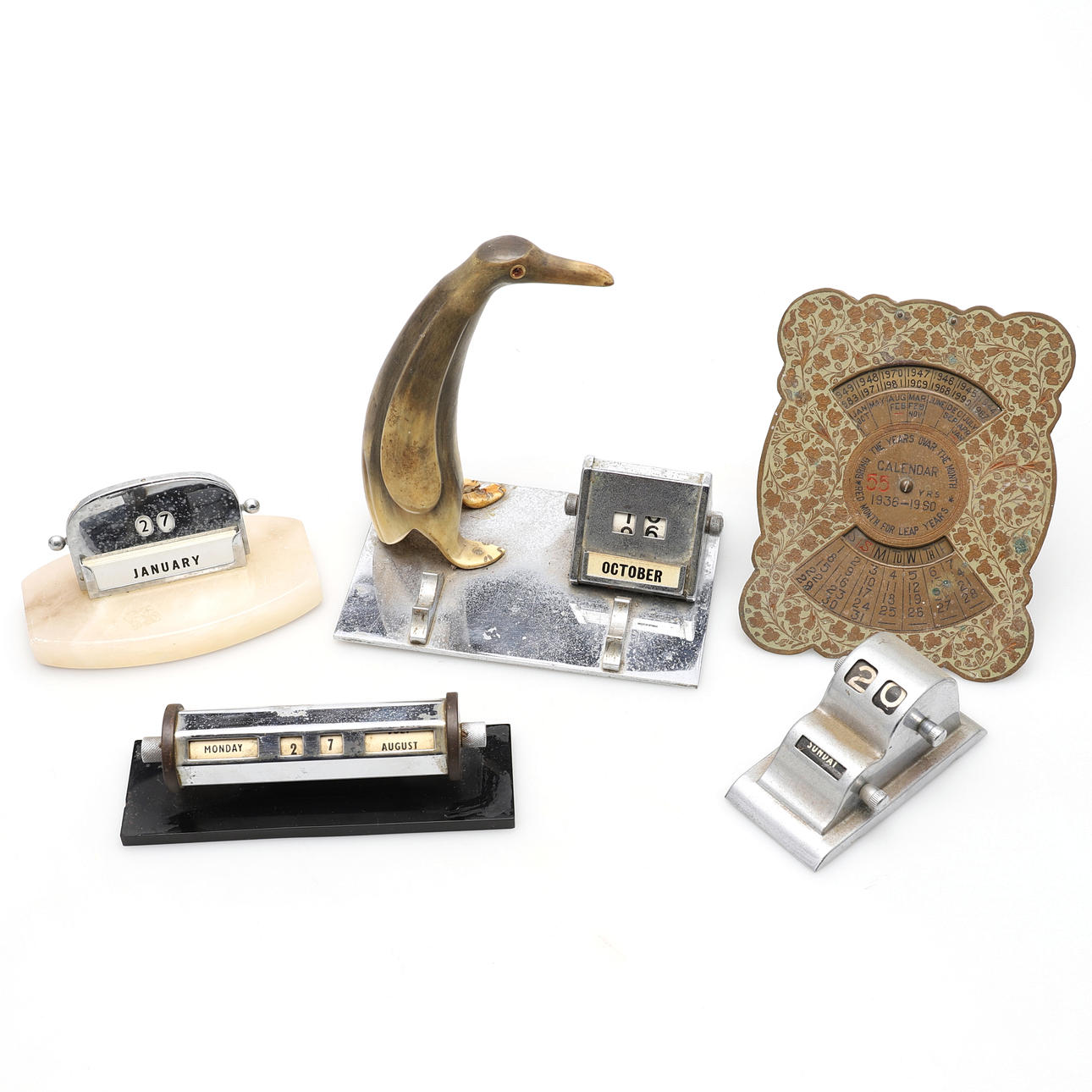 FOUR ART DECO PERPETUAL DESK CALENDARS.