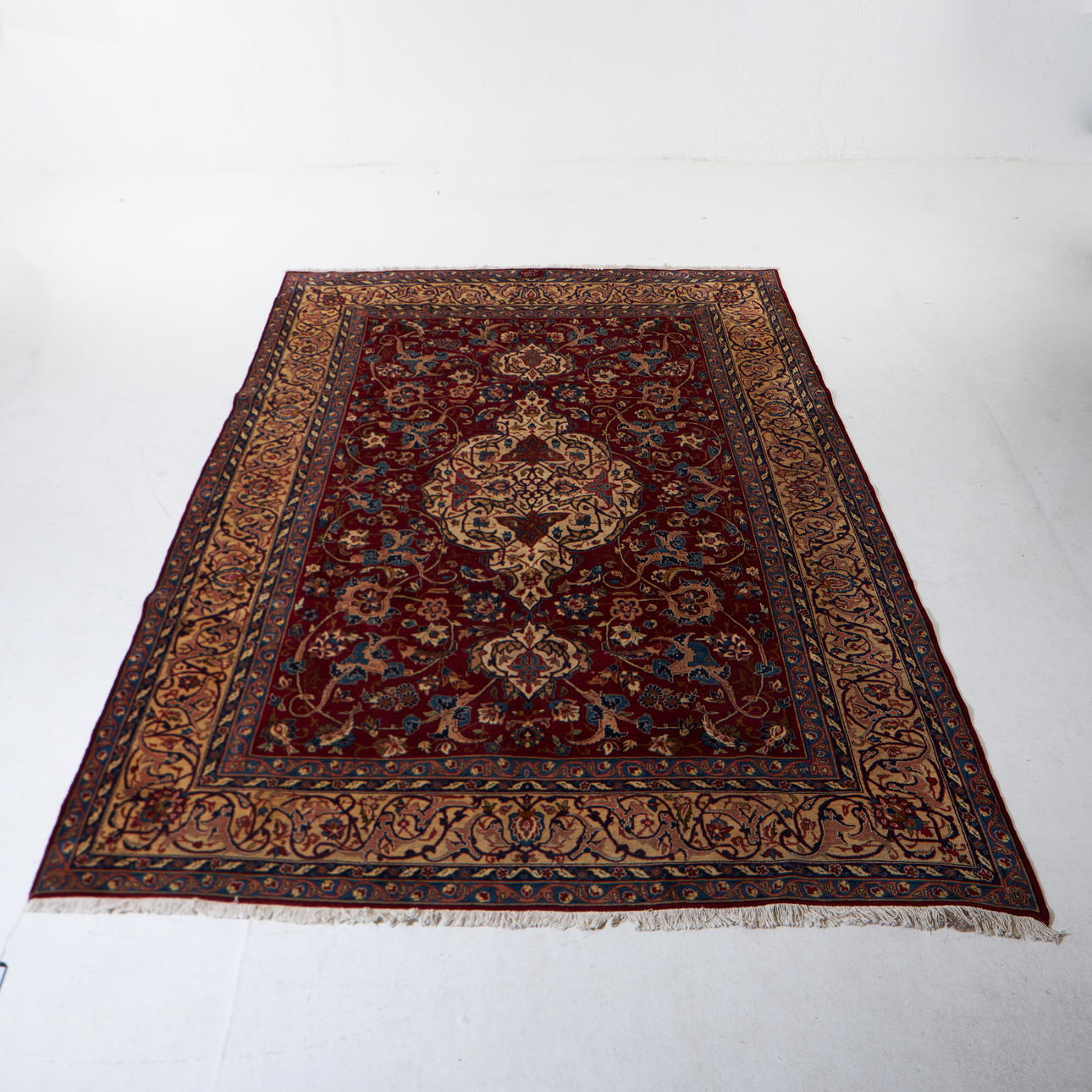 ORIENTAL CARPET, signed.