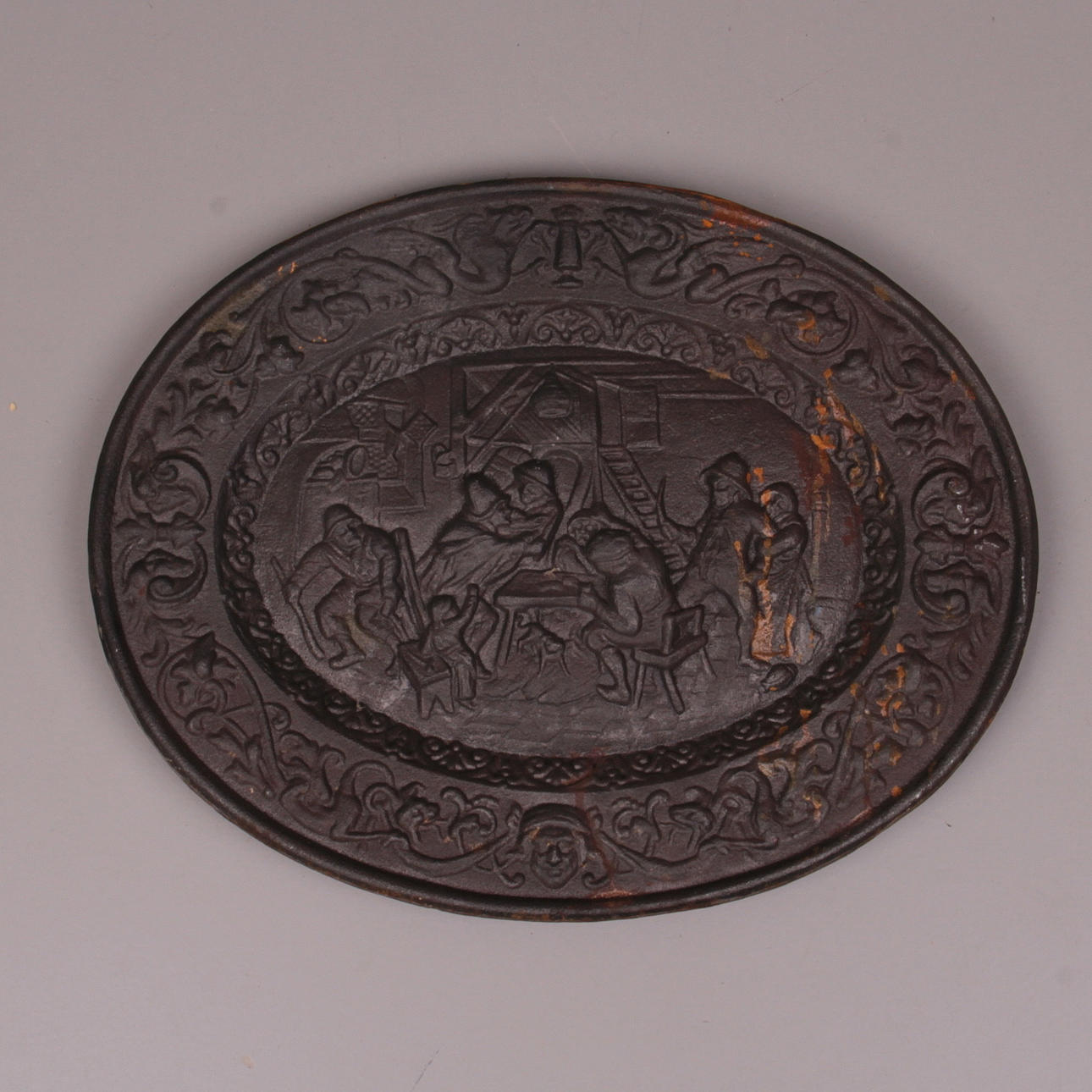 VÄGGRELIEF, gjutjärn, dekor av krogscen, 1900-tal.