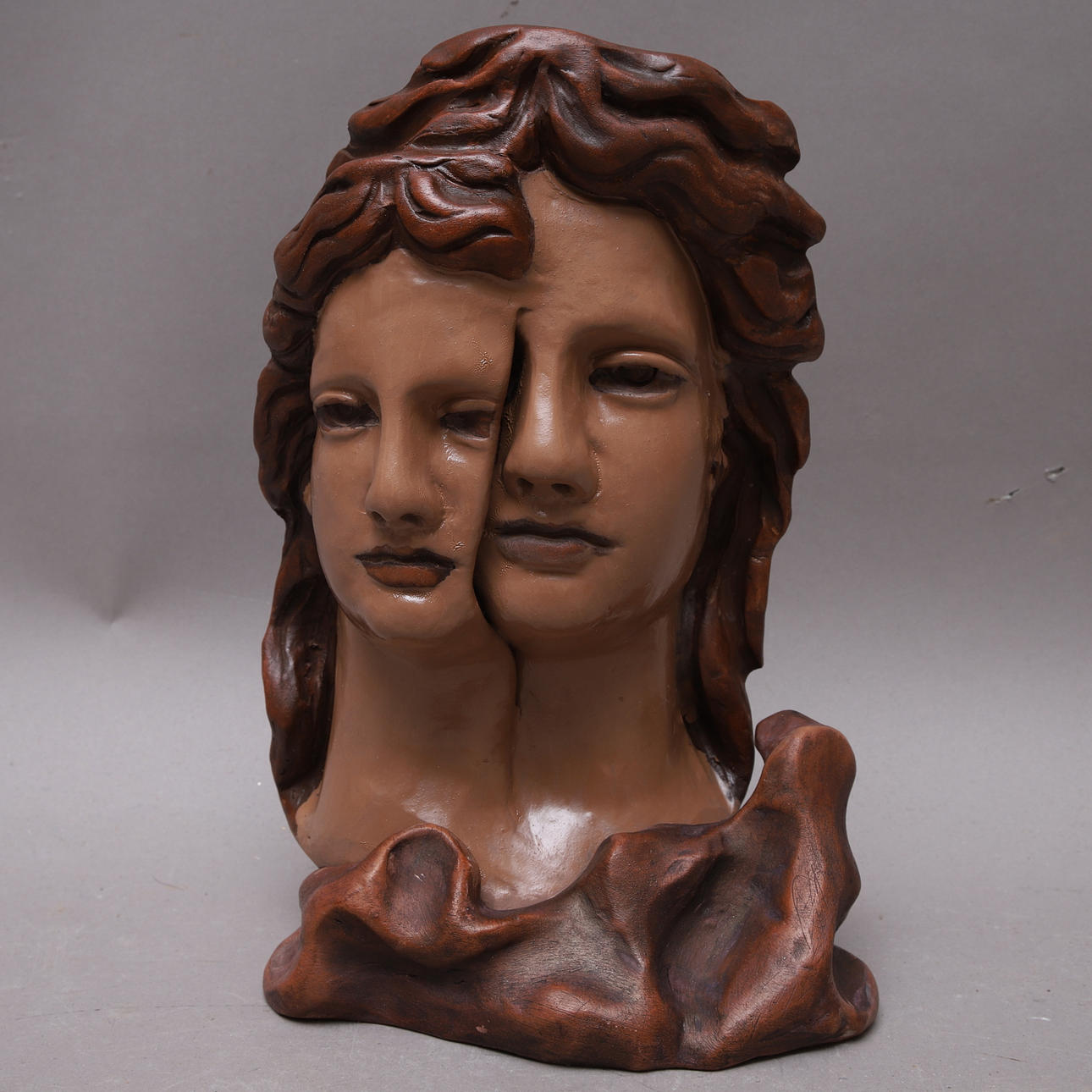 SCULPTURE, woman with two faces, ceramic.
