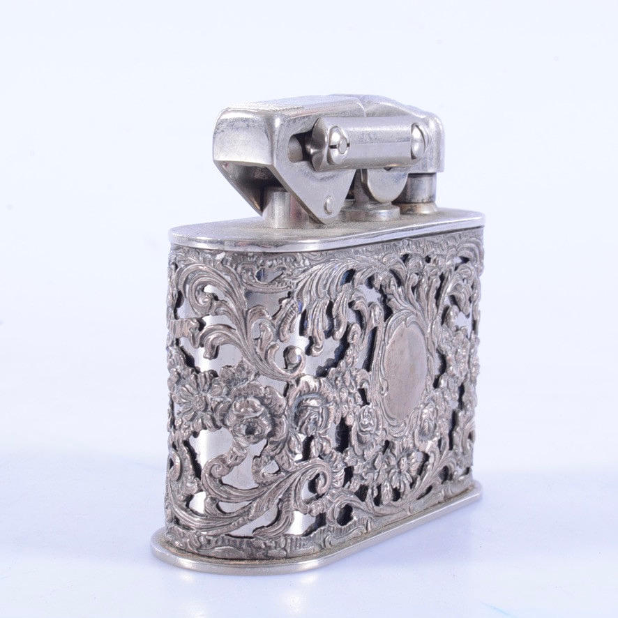 FEUERZEUG MIT SILBERMONTAGE, 1900.