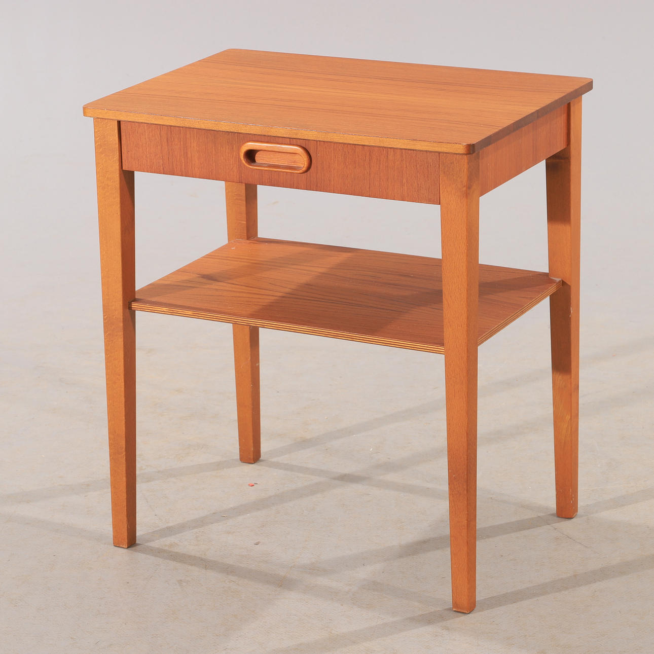 BEDSIDE TABLE, teak/beech, mid-20th century.