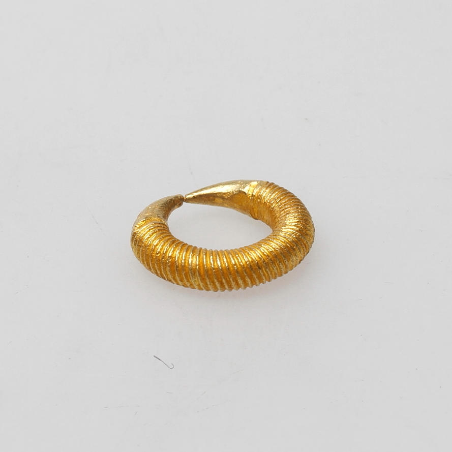 MYNT, guld, troligen Nigeria, vikt ca. 4 gram.