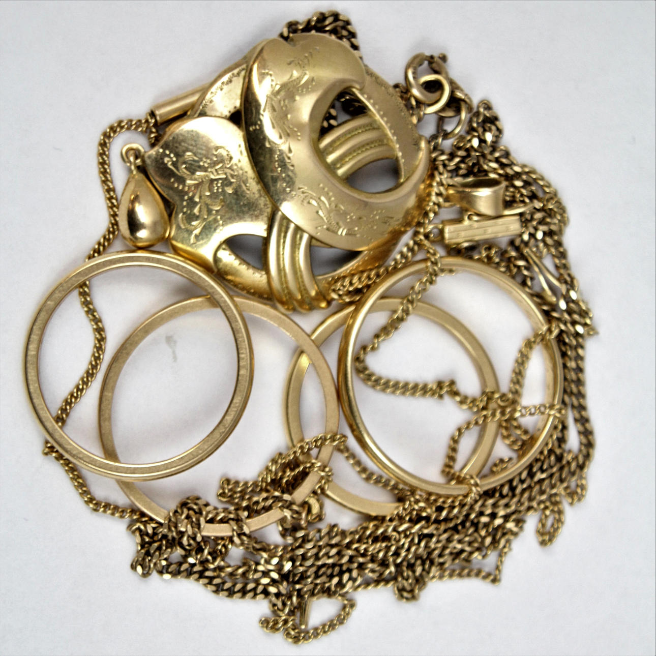 Lote oro 18K peso 25,2 gramos.