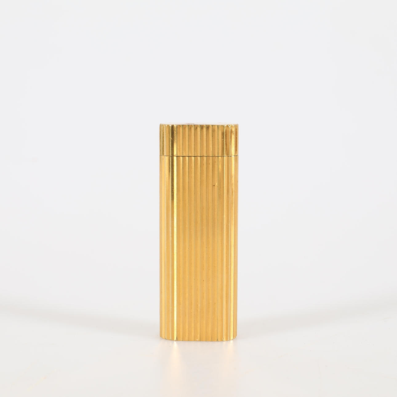 CARTIER, Feuerzeug, vergoldet.