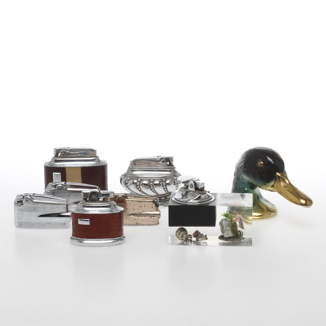 TÄNDARE, 7 st mestadels Ronson, samt kapsylöppnare "Ducky" Paris, 1900-tal.