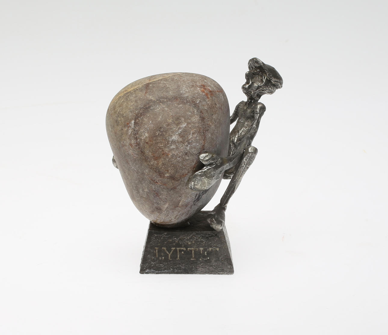 HENRY GUSTAVSSON. TENNSKULPTUR, "Lyftet", 1989, signerad.