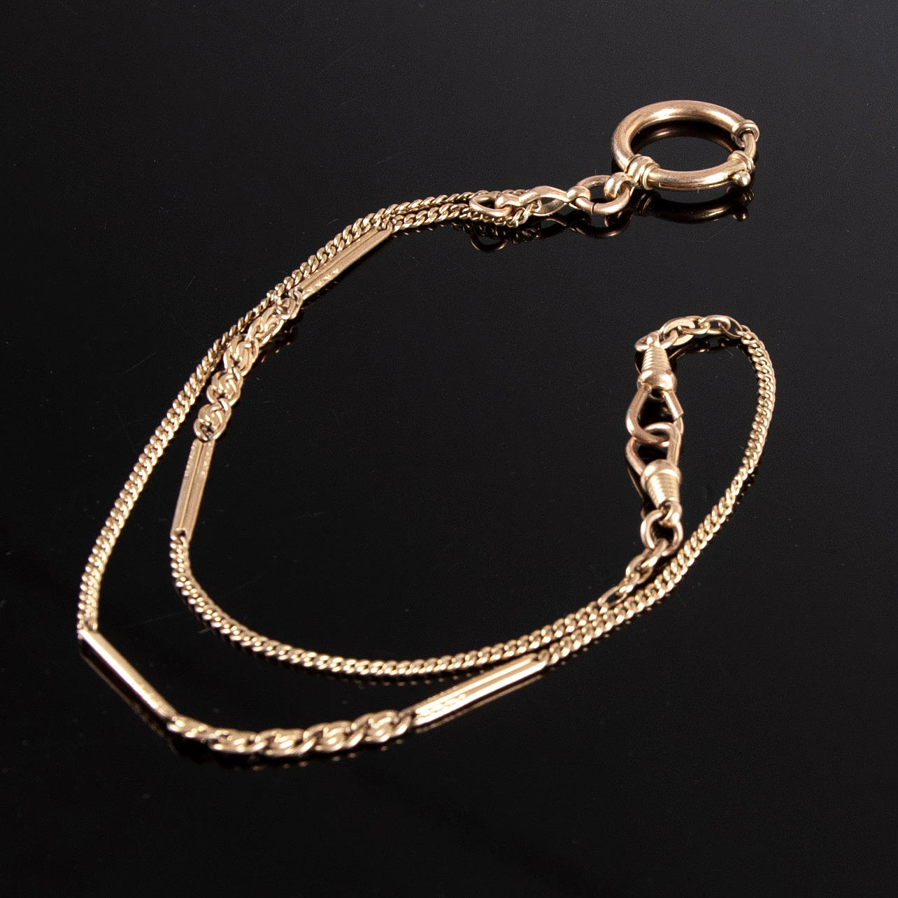 KLOCKKEDJA. A.M. Charnier, 1920/30-tal, doublé.